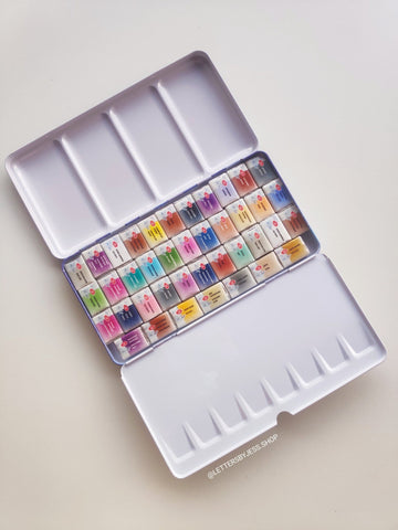 Estuche vacío para acuarelas sin soporte (metal) - Grande + 66 medios godets - Letters by Jess Shop